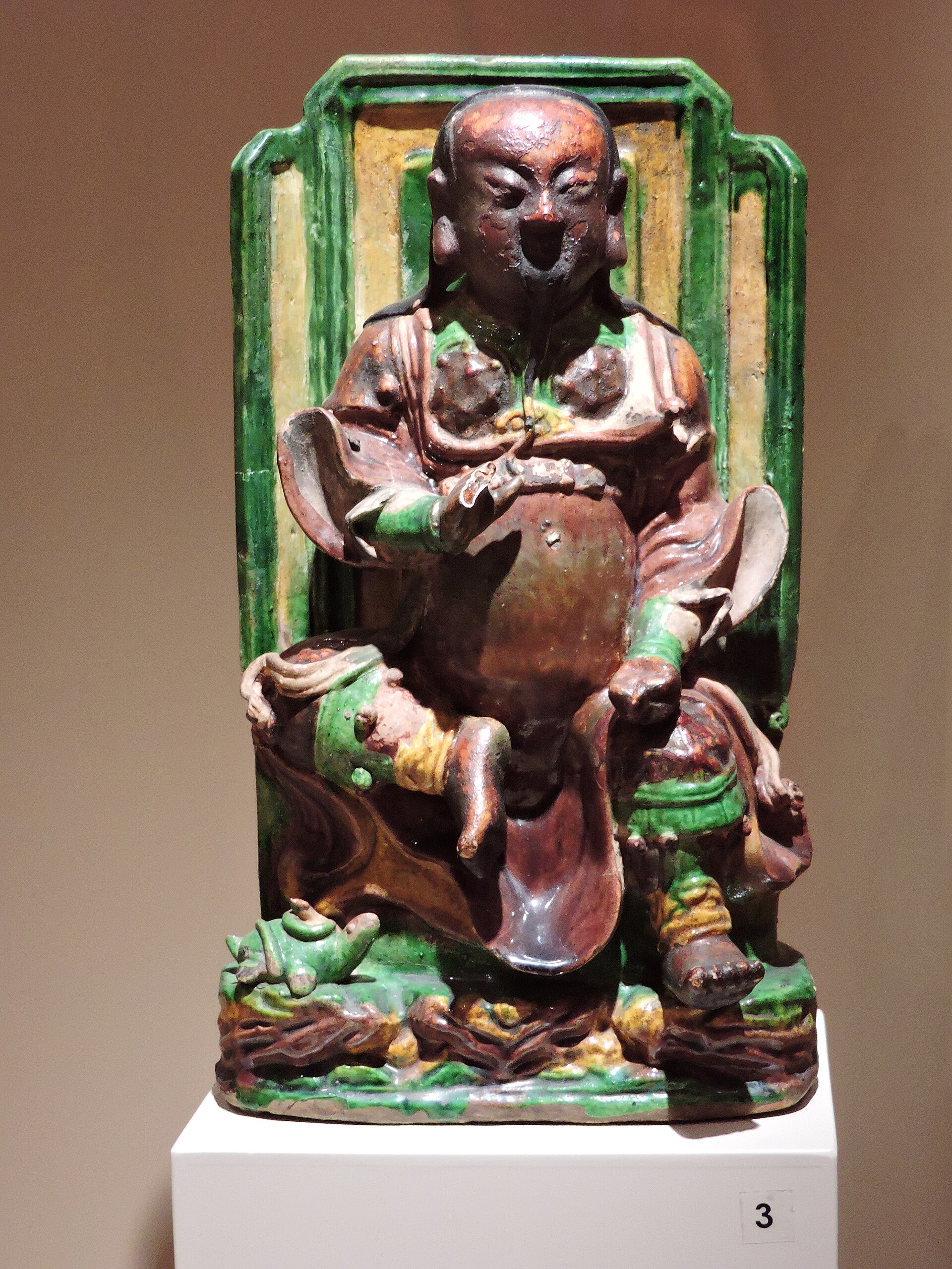 Stoneware with glaze figurine of Guandi, the god of war